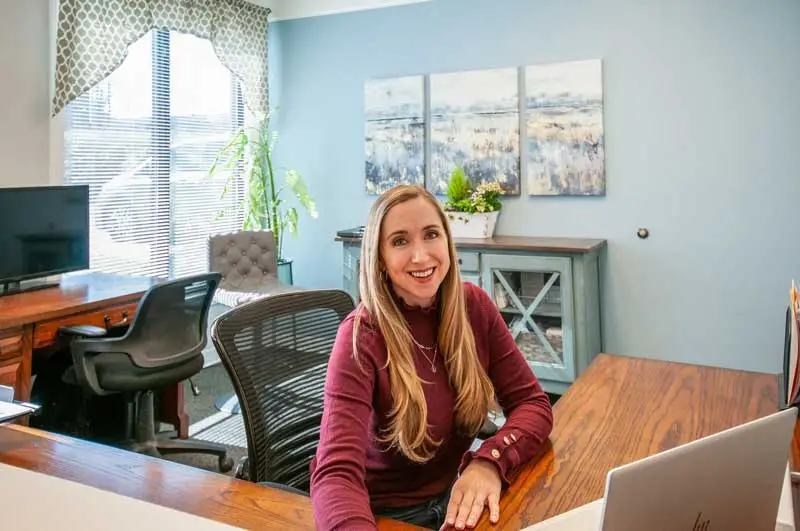 Brynn Sanchez at her desk