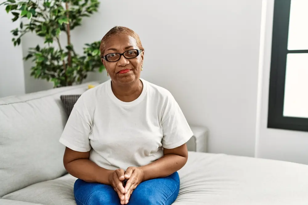 Woman sitting on couch